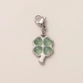 Detailed close-up of a silver four-leaf clover pendant with green heart-shaped resin stones - Steel Color Four Leaf Clover Pendant