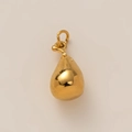 Macro shot of 18K gold plated stainless steel teardrop pendant with high polish finish - Pear Pendant