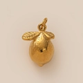 Detailed view of 18K gold plated lemon pendant with leaf detail and textured finish - Lemon Charm