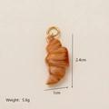 Realistic croissant pendant in golden resin with gold ring, 2.4cm height, weight 5.8g - No. 9 Croissant Pendant