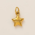 Detail of matte gold star pendant with artistic Lucky engraving and metal ring - Star Charm