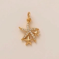 Golden starfish pendant set with white diamonds on a warm minimalist background - Starfish
