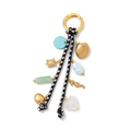 Nautical charm keychain with golden seahorse shell and braided rope in blue tones - Black and White Rope Seahorse