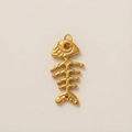 Detailed macro view of a golden fishbone charm pendant with polished metallic finish - Fishbone (20*40mm)