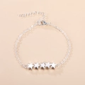 Minimalistische armband met vijf gepolijste sterren op een verstelbare schakelketting zilver - Zilver