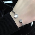 Elegant silver moonstone open bracelet with floral bud design and sparkling stone accents - Flower Bud Moonstone Open Bracelet (JZ1690)