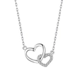 Elegant silver interlocking heart necklace with pavé crystal accents on white background - Silver