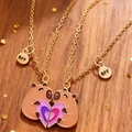 Close-up of magnetic Capybara BFF necklaces with enamel hearts and gold finish - Capybara Heart Splicing (#6)