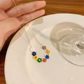 Kleurrijke bloemen kralenketting met gouden ketting en veelkleurige glazen bloemen - Goud