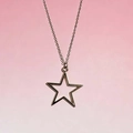 Minimalist silver hollow star pendant necklace with fine chain on pink background - Pentagram Necklace (Gold)