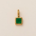 Macro shot of gold-plated pendant featuring an emerald green square gemstone inlay - May Birthstone Pendant / Gold