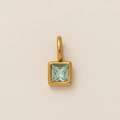 Square light blue gemstone pendant with 18K gold bezel setting on beige background - March Birthstone Pendant / Gold