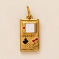Retro golden Game Boy game console charm with detailed buttons and metallic finish - Game Console