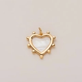 Close-up of elegant gold stainless steel heart pendant with white shell inlay detail - Heart Pendant