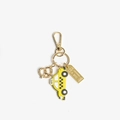 Detail of NYC themed keychain with yellow taxi, pretzel charm and golden LGA plaque - Car