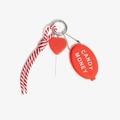 Detail of red heart lollipop charm and braided rope keychain with Candy Money text - Heart Tag