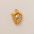 Detailed view of strawberry pendant with yellow rhinestones and gold plating - Strawberry Style