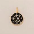 Detailed close-up of a 18K gold-plated round pendant with black enamel and moon stone - Zodiac Wheel Style