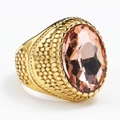 Detailansicht eines Vintage-Rings aus Gold mit ovalem Champagnerstein und geprägtem Band - Größe 7 / Gold mit Champagner-Strasssteinen