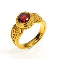 Detail of vintage gold ring featuring a round ruby gemstone and ornate vine engravings - Size 7 / Gold (Red Rhinestone)