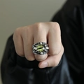 Macro shot of punk gothic dragon eye ring featuring realistic green pupil and silver scales - US 7 / Steel Color Green Eye