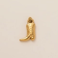 Detailed view of golden cowboy boot pendant with floral engraving and polished finish - Boot 3