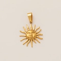 Detail of 18K gold-plated sun face pendant with wavy rays and polished metallic texture - Anthropomorphic Sun Relief Pendant (7)