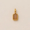 Gold plated stainless steel pendant featuring a rectangular translucent pink gemstone - October Pendant