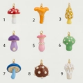 Detailed grid of nine colorful mushroom charms with dripping oil finish and faux pearls - 1 Red Mushroom