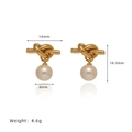 Boucles d'oreilles nœud doré avec perle blanche et mesures de taille précises - Boucles d'oreilles nouées dorées