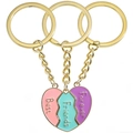 Gros plan sur le jeu de trois porte-clés puzzle en forme de cœur Best Friends Forever - Porte-clés Cœur Magnétique / Ensemble trois pièces / Or