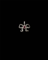 Vintage bow pendant with red heart zircon in silver finish on black background - Ribbon Bow Pendant Silver