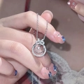 Silver bow moonstone wreath pendant necklace with double ring and pearl center - Silver