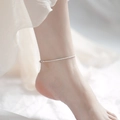Close-up of minimalist silver drawstring anklet with sparkling fine chain on ankle - Anklet (JK006) / Silver