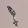 Silver metal star bow BB hair clip with Y2K aesthetic on pink background - Star Christmas Tree Bow