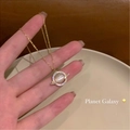 Sparkling zircon planet pendant necklace with gold chain and cosmic galaxy design for women - Gold