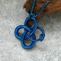 Macro shot of blue stainless steel ouroboros pendant with detailed snake scale textures - Pendant Only (No Chain) / Blue Pendant Necklace