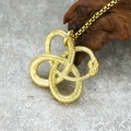 Macro shot of gold stainless steel ouroboros snake knot pendant with detailed scale texture - Pendant Only (No Chain) / Gold Color Pendant