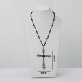 Y2K punk style cross necklace with black beads and a large silver pendant charm - Necklace / Dark Cross Necklace