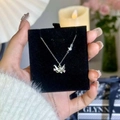 Zilveren origami kraanvogel ketting met roze zirkonia en een klein sterretje detail - Papieren Kraanvogel Ketting