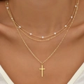Detailed view of triple-layered gold necklace with pearls and cross pendant for women - Gold Three-Layer Pearl Cross Necklace (XL1080-10)
