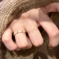Detail of yellow enamel ring with gold metal base and micro-inlays on a knit sweater - Yellow Three Diamonds (JZ257)