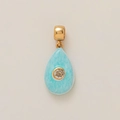 Detail of light blue teardrop pendant with gold-plated clasp and cubic zirconia inlay - Lake Green