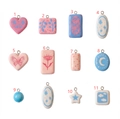 Close-up of mixed ceramic charms with floral and star patterns in 11 different pastel shapes - 1 Heart Flower Pendant Only (Without Chain)