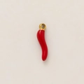 Detailed macro view of a red chili pendant with 18k gold plated metal loop for DIY jewelry - Chili Pendant