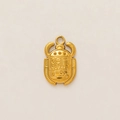 Macro shot of 18k gold plated stainless steel scarab pendant with ancient hieroglyphs - Scarab Beetle Pendant