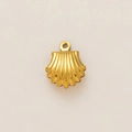 Detailed view of a gold-plated shell pendant with a textured brushed metallic finish - Striped Shell Charm