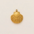 Macro shot of 18k gold plated stainless steel seashell pendant with radiant textures - Large Shell Pendant