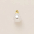 Macro detail of a white teardrop pearl pendant with 18k gold-plated stainless steel ring - Teardrop Pearl Pendant