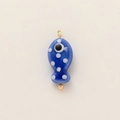 Detail of blue fish evil eye pendant with 18k gold-plated accents and white polka dots - Blue Polka Dot Fish Pendant